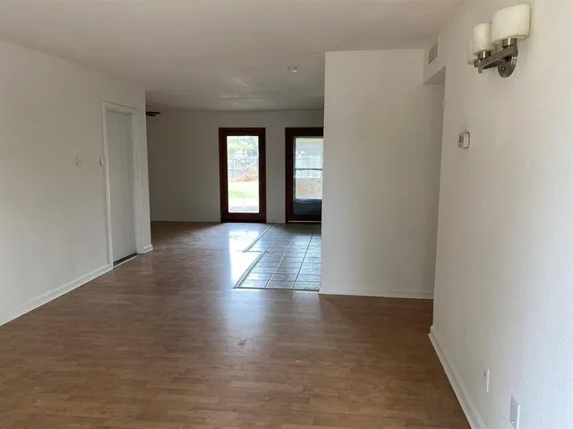 a view of livingroom with hardwood floor and window