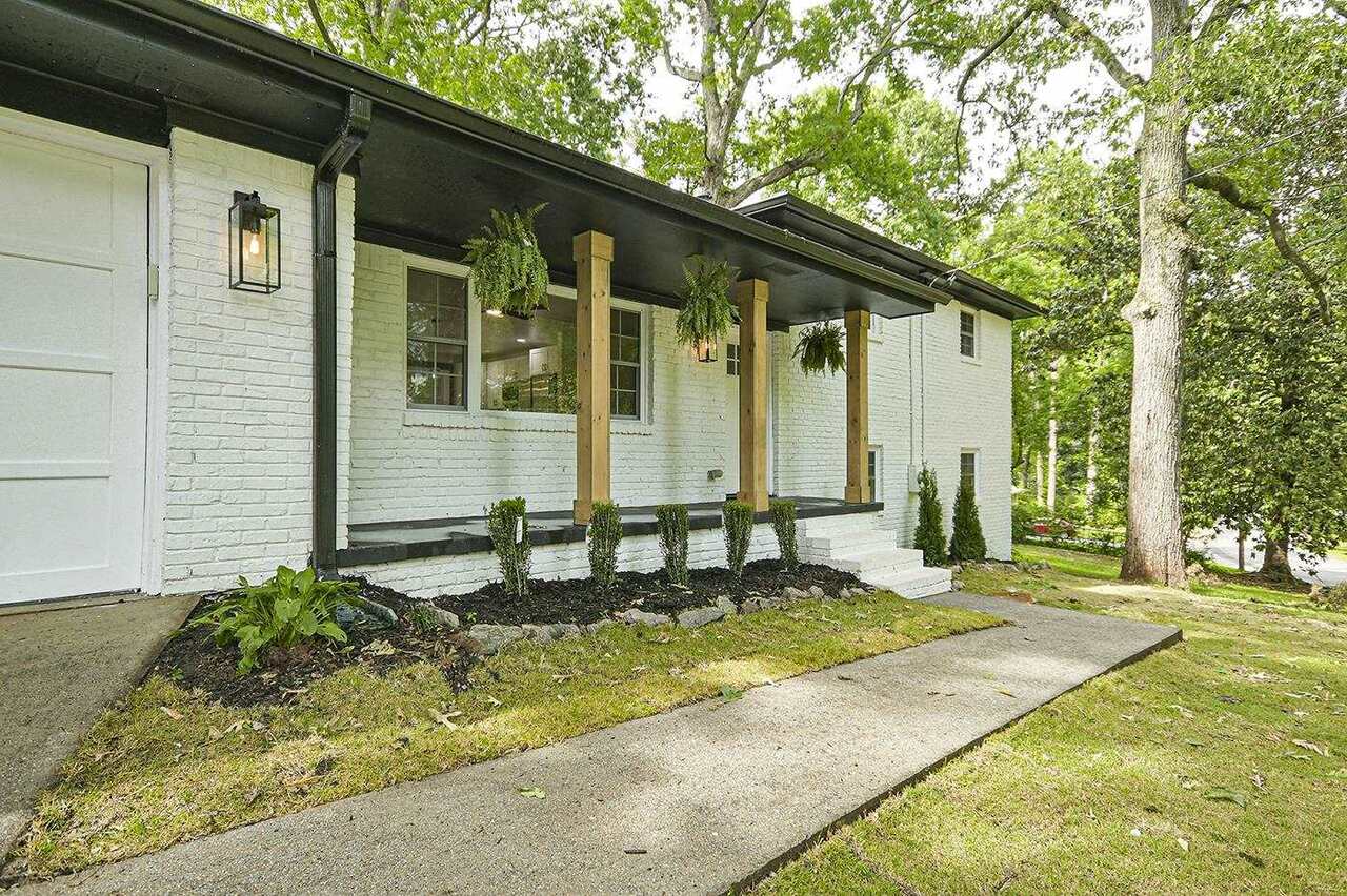 1998 Barberrie Lane Decatur, GA 30032 - Photo 1 of 1 a front view of house with yard