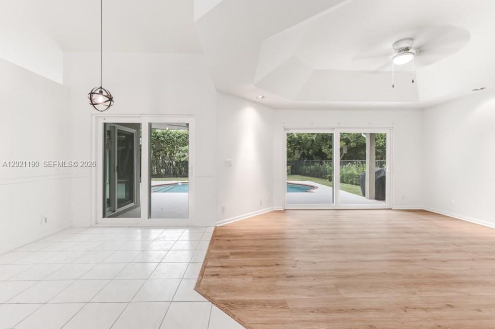 814 Heron Road Weston, FL 33326 - Photo 12 of 27 a view of an empty room with a window