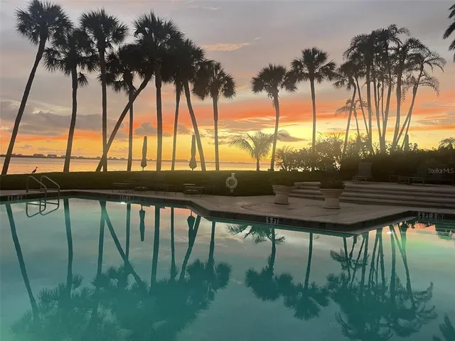 a view of swimming pool from a lake