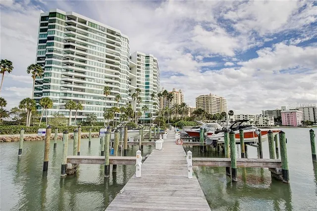 a view of a tall building with a lake view