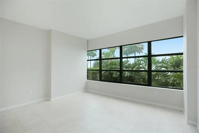 a view of an empty room with a large window