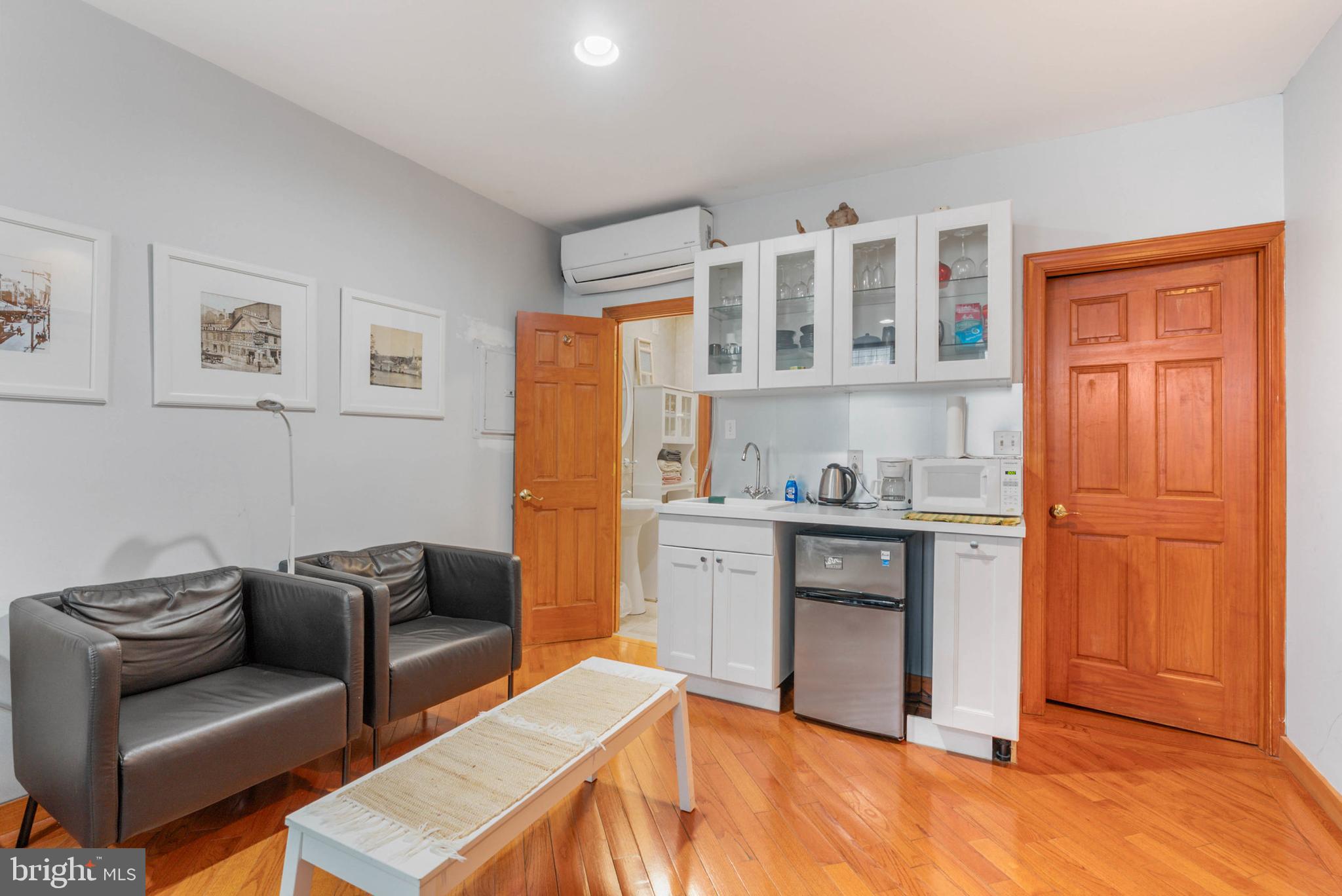 105 South 2nd Street Philadelphia, PA 19106 - Photo 24 of 54 a living room with stainless steel appliances kitchen island granite countertop a refrigerator and a stove