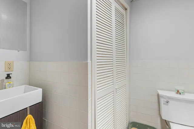 a laptop computer sitting on top of a table