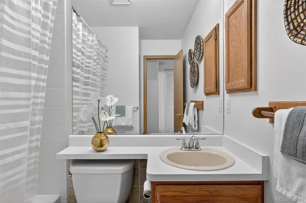 a bedroom with bed and window