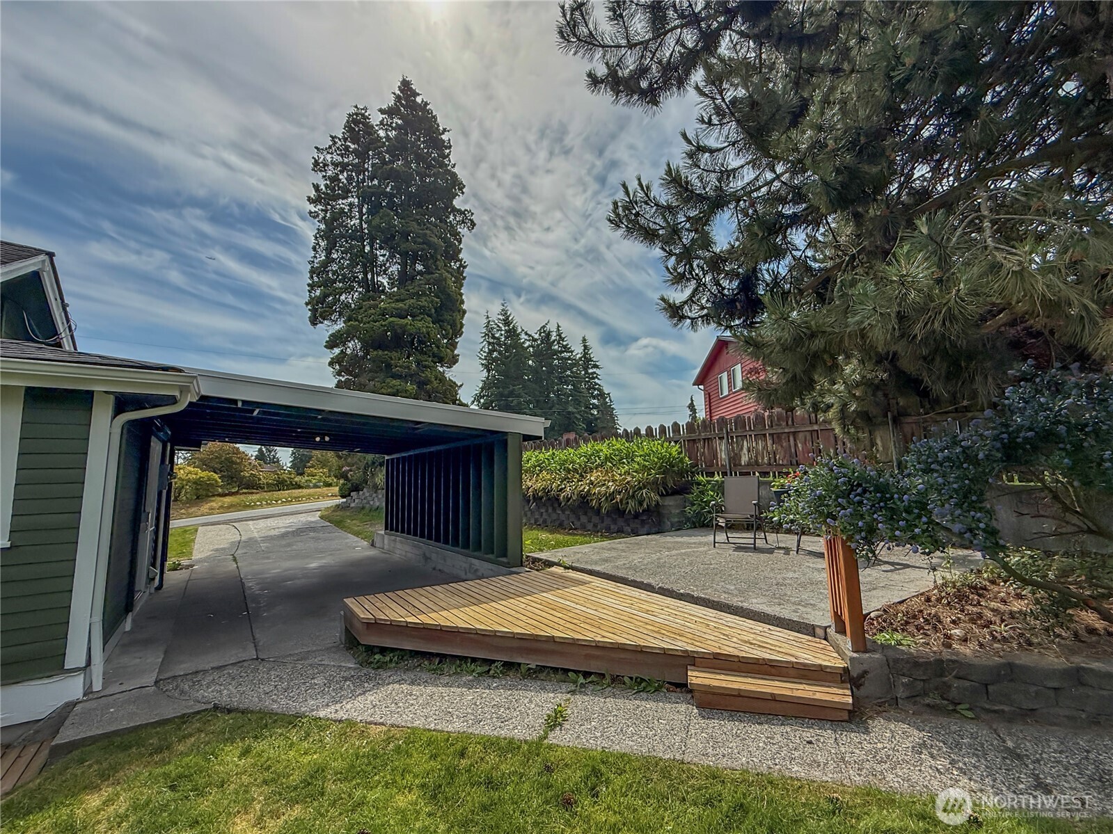5302 Rockefeller Avenue Everett, WA 98203 - Photo 21 of 26 a view of patio with a table and chairs and a fire pit