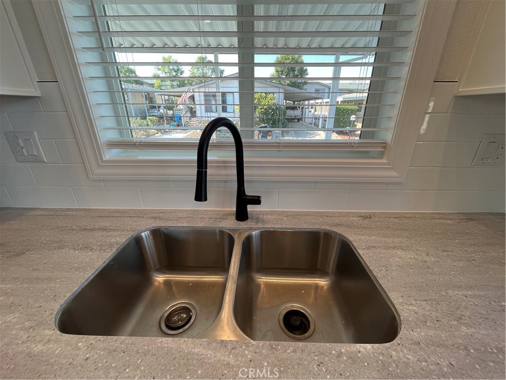 1550 Rimpau Avenue, Unit 42 Corona, CA 92881 - Photo 7 of 22 a close view of sink and tap