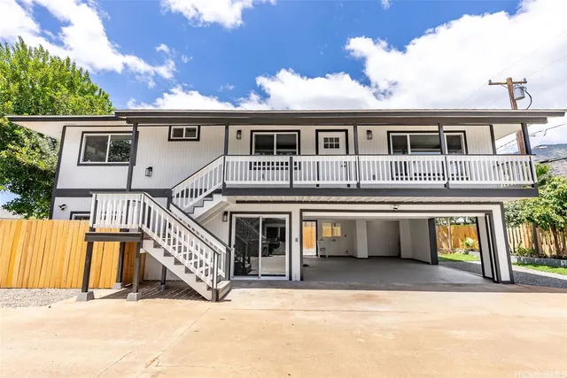 a front view of a house with a balcony
