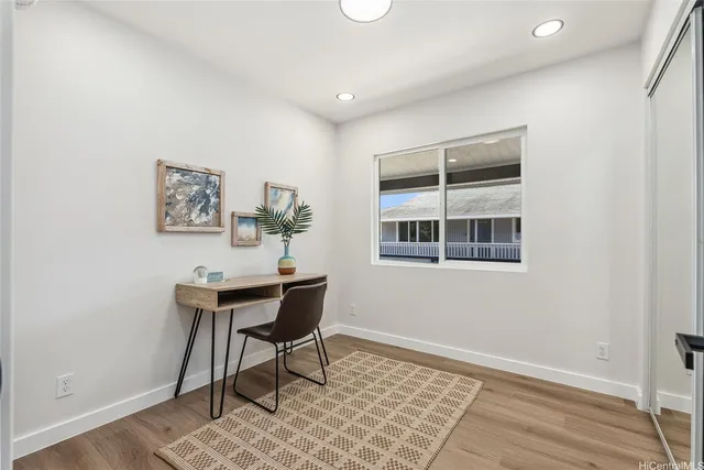 a workspace with furniture and window