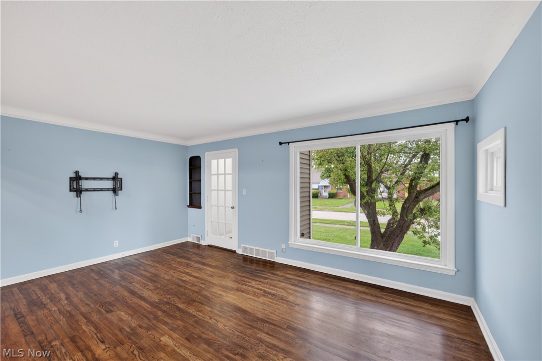 4186 Lambert Road South Euclid, OH 44121 - Photo 4 of 36 The Living Room is bathed in natural light from the large windows