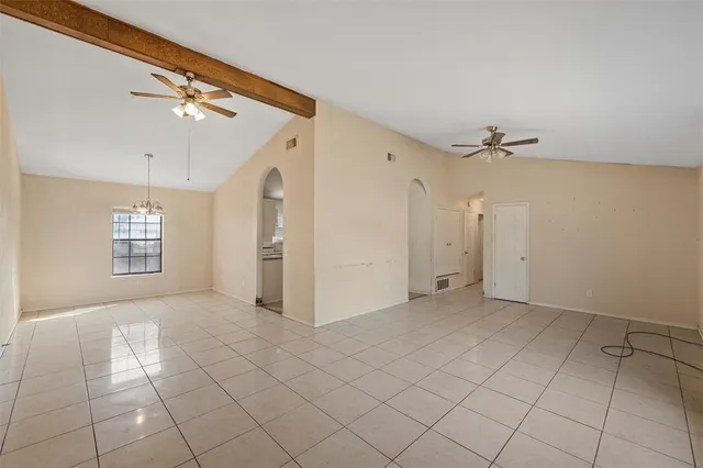 a view of a livingroom with a staircase