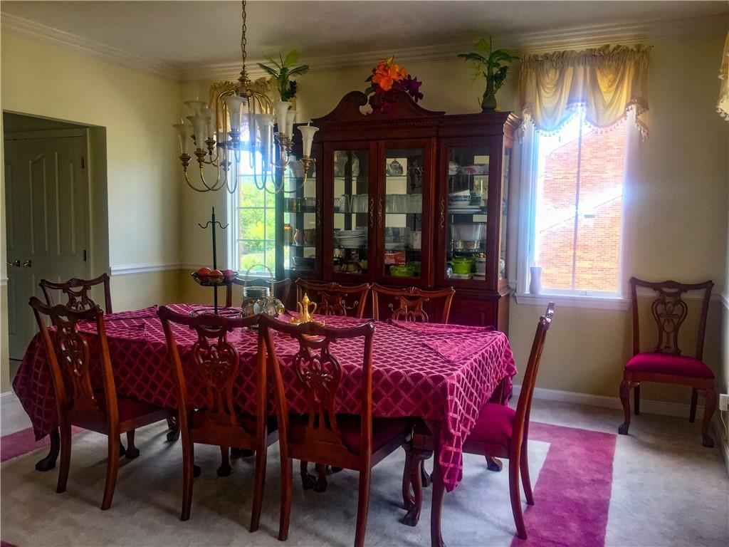 5076 Brownsville Road Pittsburgh, PA 15236 - Photo 11 of 50 a view of a dining room with furniture and window