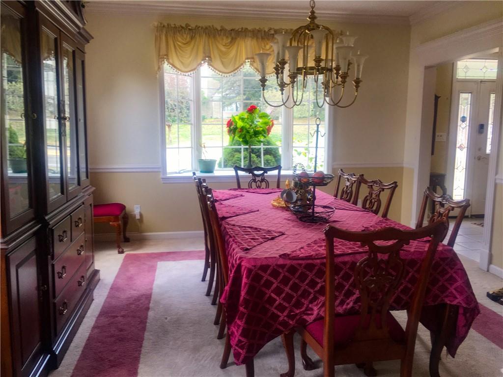 5076 Brownsville Road Pittsburgh, PA 15236 - Photo 12 of 50 a view of a dining room with furniture window and outside view