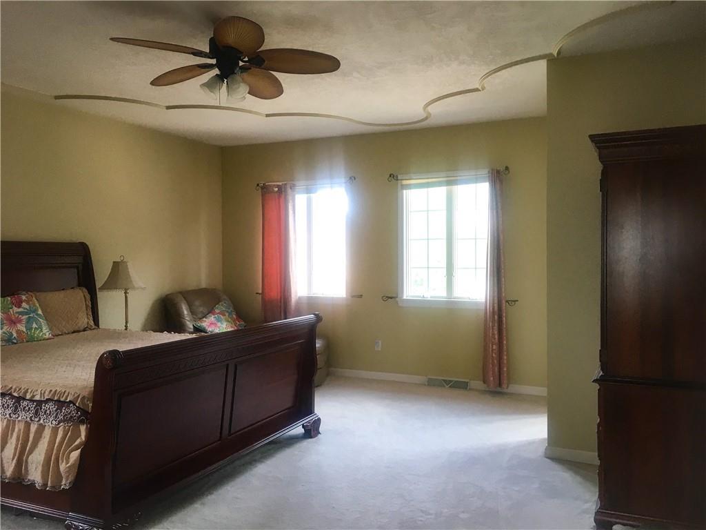 5076 Brownsville Road Pittsburgh, PA 15236 - Photo 25 of 50 a bedroom with furniture and window