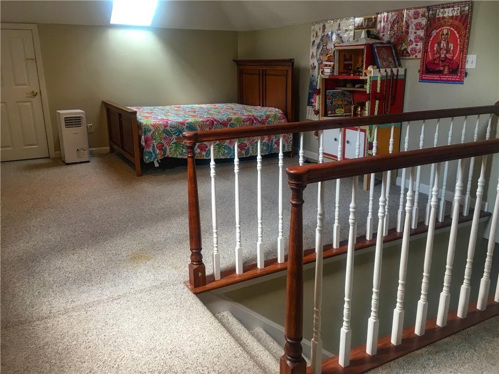 5076 Brownsville Road Pittsburgh, PA 15236 - Photo 35 of 50 a bedroom with furniture and a window
