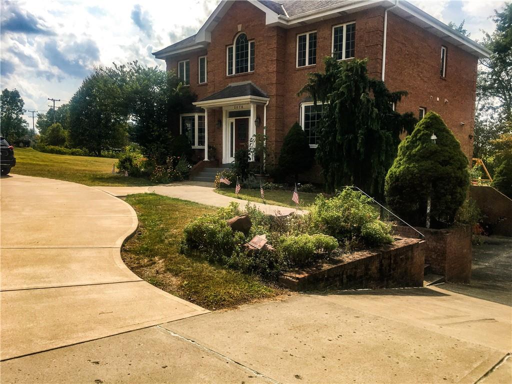 5076 Brownsville Road Pittsburgh, PA 15236 - Photo 4 of 50 a view of a house with a yard