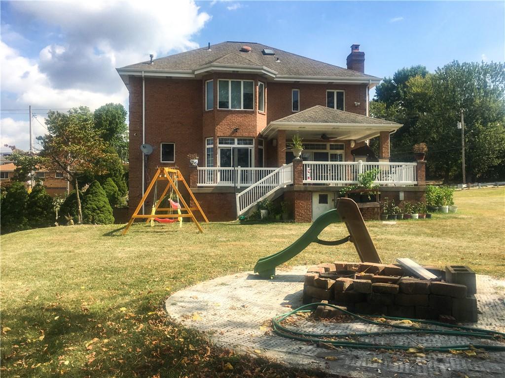 5076 Brownsville Road Pittsburgh, PA 15236 - Photo 45 of 50 a front view of a house with a yard