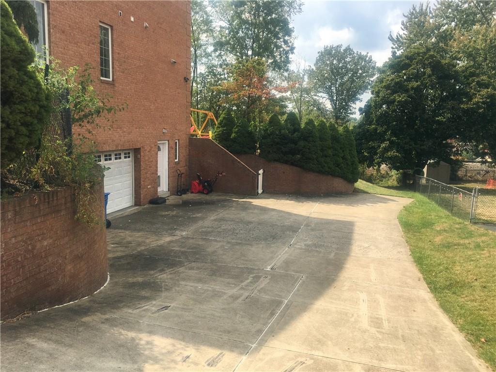 5076 Brownsville Road Pittsburgh, PA 15236 - Photo 49 of 50 a view of swimming pool with a yard