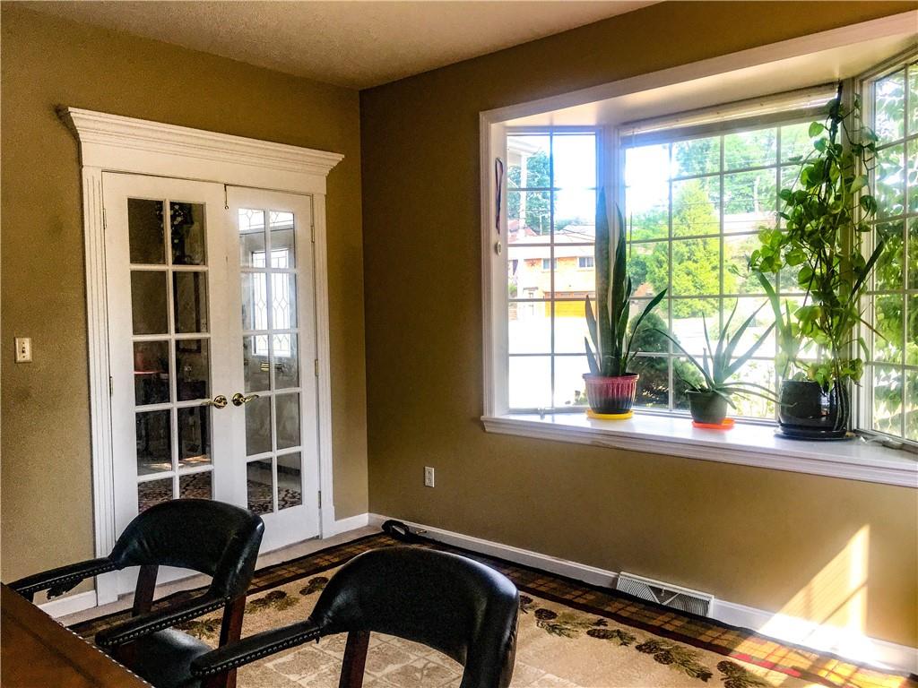 5076 Brownsville Road Pittsburgh, PA 15236 - Photo 10 of 50 a view of a window and chair in a room