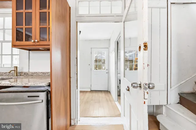 view of living room with furniture and windows