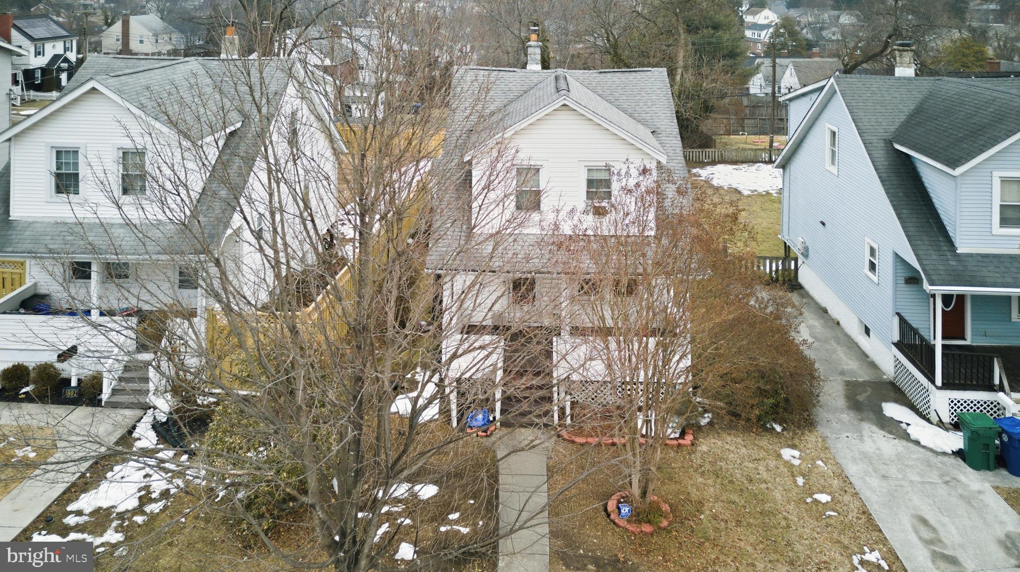 3804 Ridgecroft Road Baltimore, MD 21206 - Photo 17 of 23 a view of a brick house with many windows