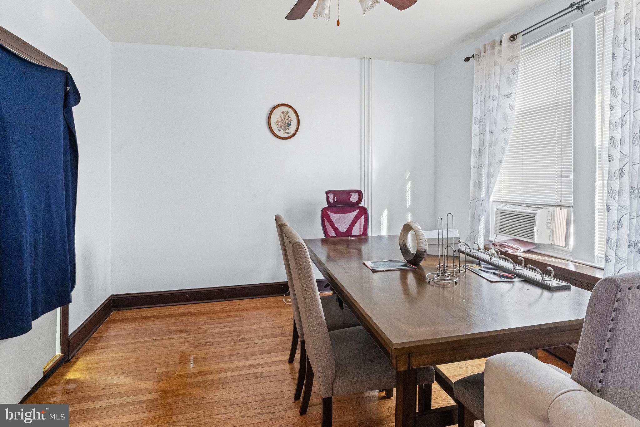 3804 Ridgecroft Road Baltimore, MD 21206 - Photo 5 of 23 a view of a dining room with furniture and window