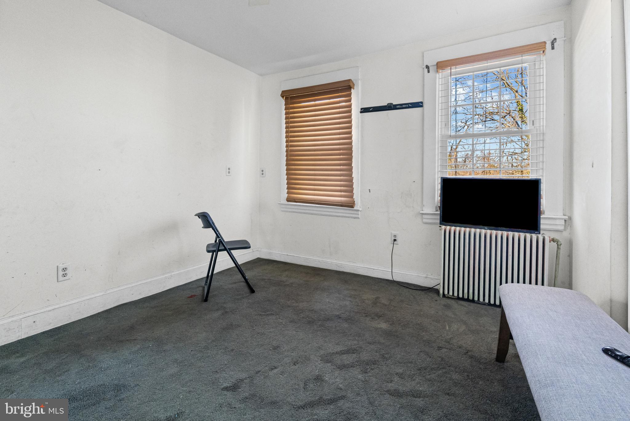 3804 Ridgecroft Road Baltimore, MD 21206 - Photo 10 of 23 a living room with a couch