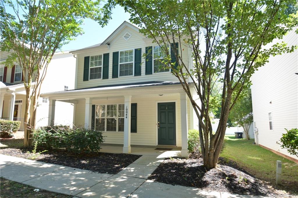10044 Caldwell Depot Road Cornelius, NC 28031 - Photo 2 of 16 a front view of a house with a yard