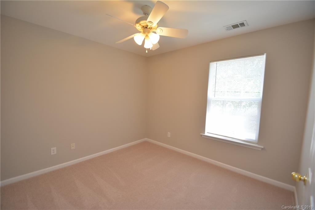 10044 Caldwell Depot Road Cornelius, NC 28031 - Photo 13 of 16 an empty room with a window