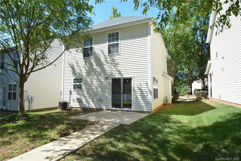 10044 Caldwell Depot Road Cornelius, NC 28031 - Photo 15 of 16 a view of a house with backyard and sitting area