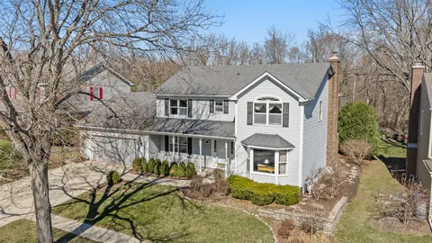 an aerial view of residential house with outdoor space