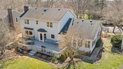 a view of house with a yard