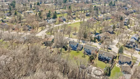 a view of lot of residential houses with outdoor space