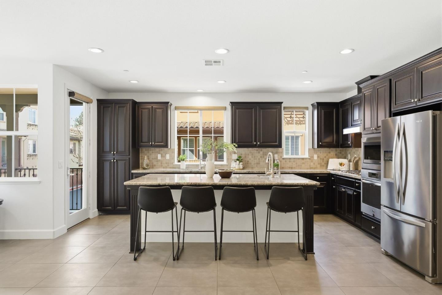 508 Holthouse Terrace Sunnyvale, CA 94087 - Photo 1 of 56 a kitchen with a sink refrigerator and cabinets