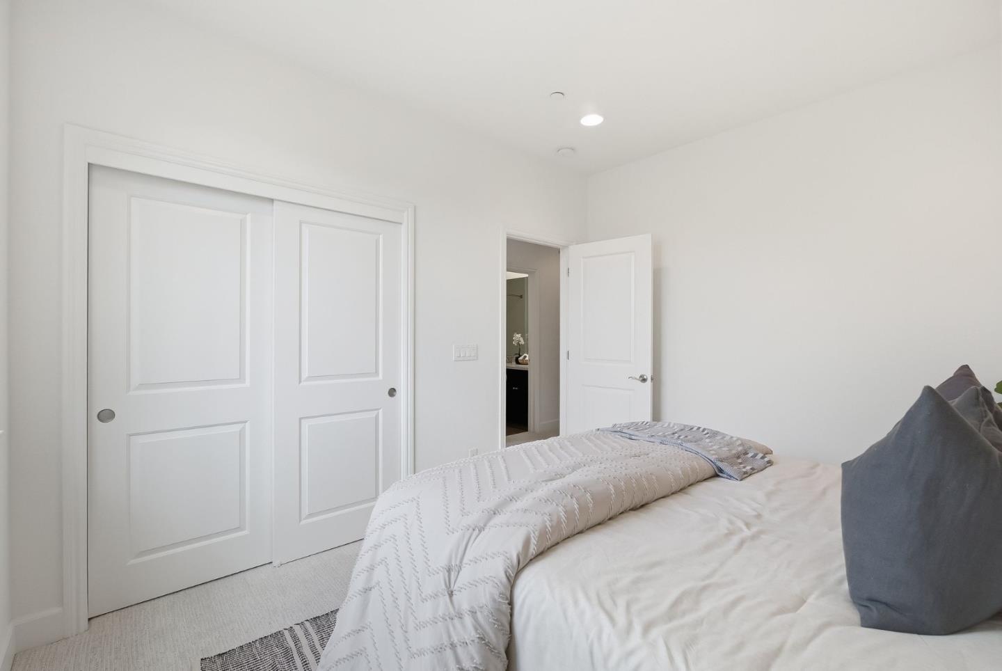 508 Holthouse Terrace Sunnyvale, CA 94087 - Photo 16 of 56 a bedroom with a bed and a window