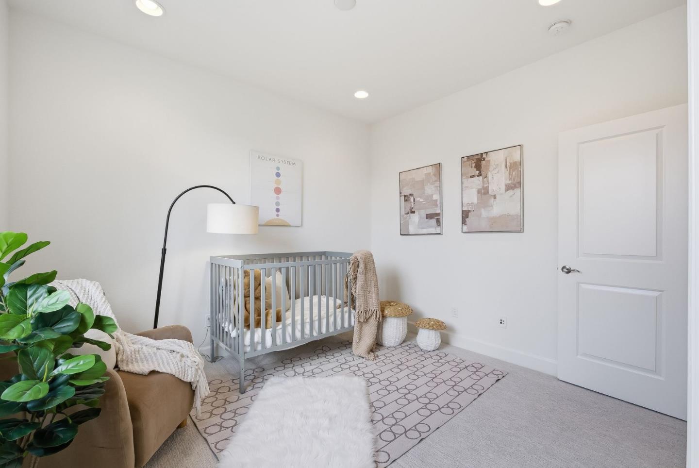 508 Holthouse Terrace Sunnyvale, CA 94087 - Photo 19 of 56 a bedroom with a bed and a potted plant