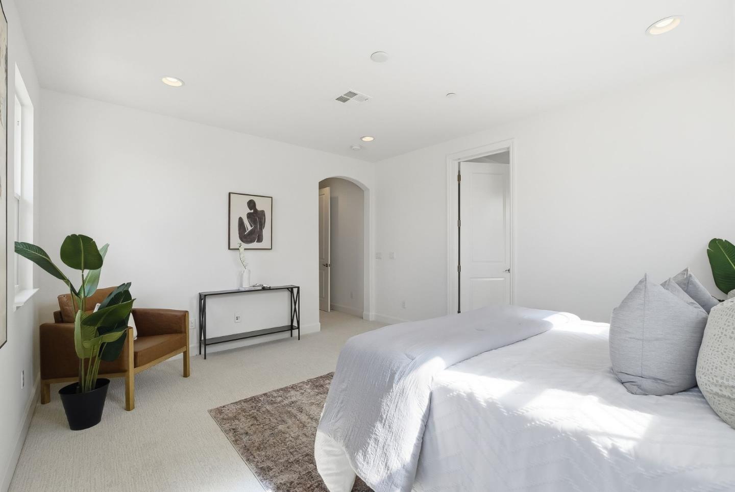 508 Holthouse Terrace Sunnyvale, CA 94087 - Photo 21 of 56 a bedroom with a bed and dresser