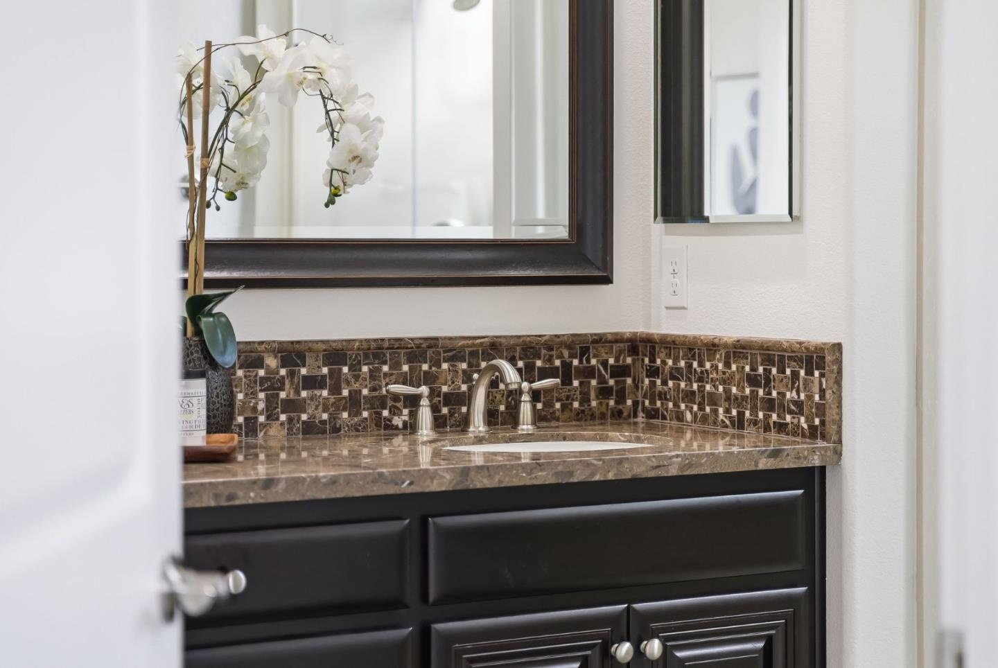 508 Holthouse Terrace Sunnyvale, CA 94087 - Photo 23 of 56 a closeup of a sink with a cabinet