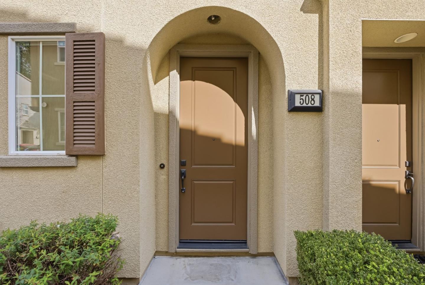 508 Holthouse Terrace Sunnyvale, CA 94087 - Photo 3 of 56 a view of a door of the house with a door and a window