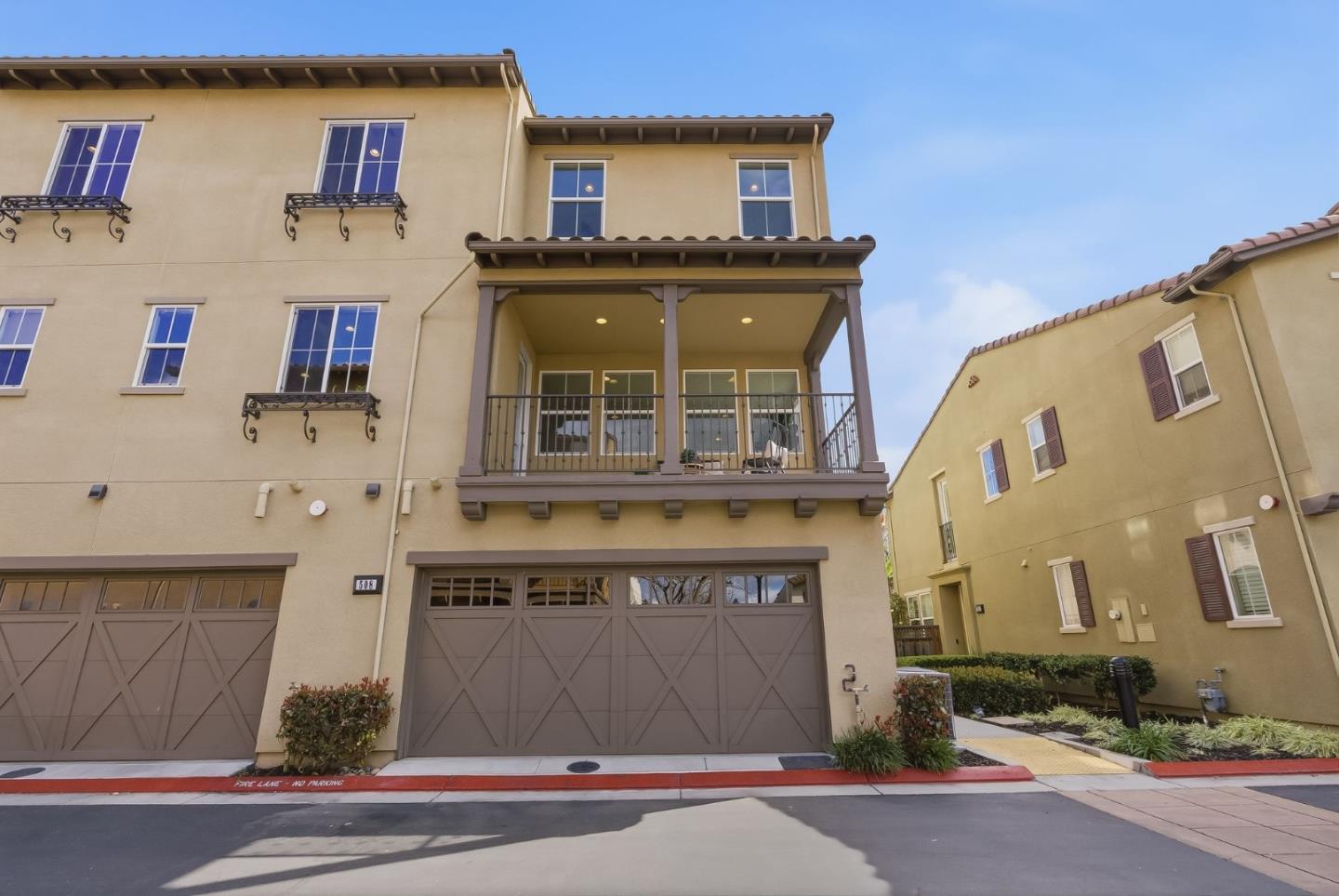 508 Holthouse Terrace Sunnyvale, CA 94087 - Photo 34 of 56 a front view of a building with grey walls