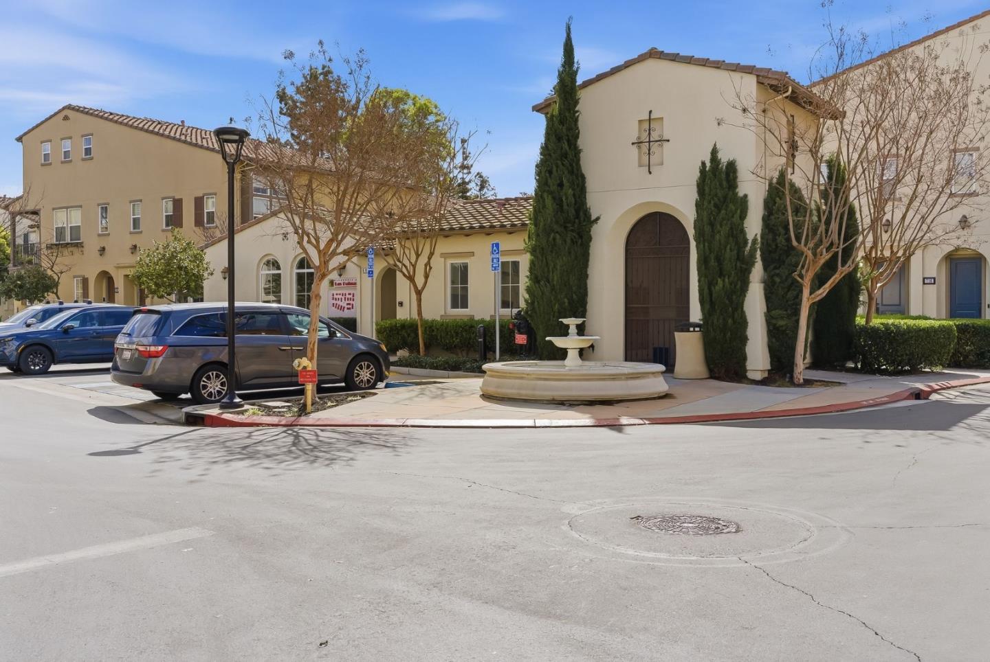 508 Holthouse Terrace Sunnyvale, CA 94087 - Photo 39 of 56 a view of a parked cars in front of building