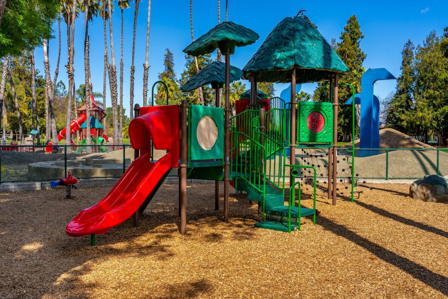 508 Holthouse Terrace Sunnyvale, CA 94087 - Photo 46 of 56 a view of a park with a slide and potted plants