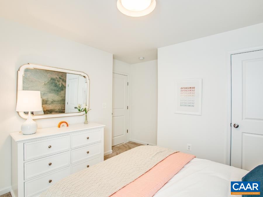 157 Lookover Terrace Stuarts Draft, VA 24477 - Photo 22 of 27 a bedroom with a bed and a dresser