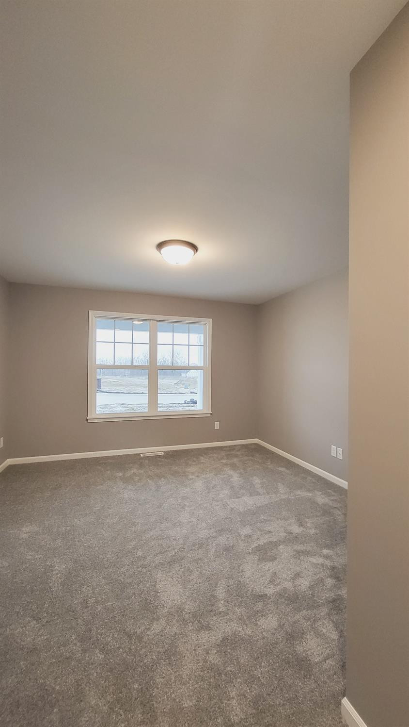 18348 Alexander Avenue Lowell, IN 46356 - Photo 22 of 24 a view of an empty room with a window