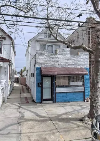 a front view of a house with a garage