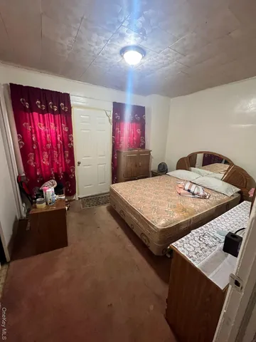 a living room with game table