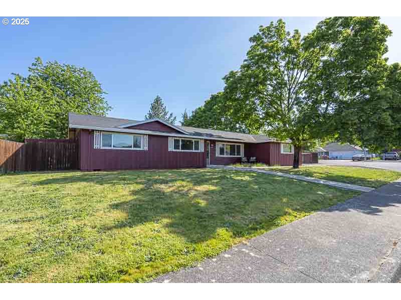 611 Northeast Bockes Loop Sheridan, OR 97378 - Photo 1 of 36 a view of a house with a backyard