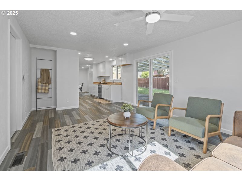 611 Northeast Bockes Loop Sheridan, OR 97378 - Photo 20 of 36 a living room with furniture and a wooden floor