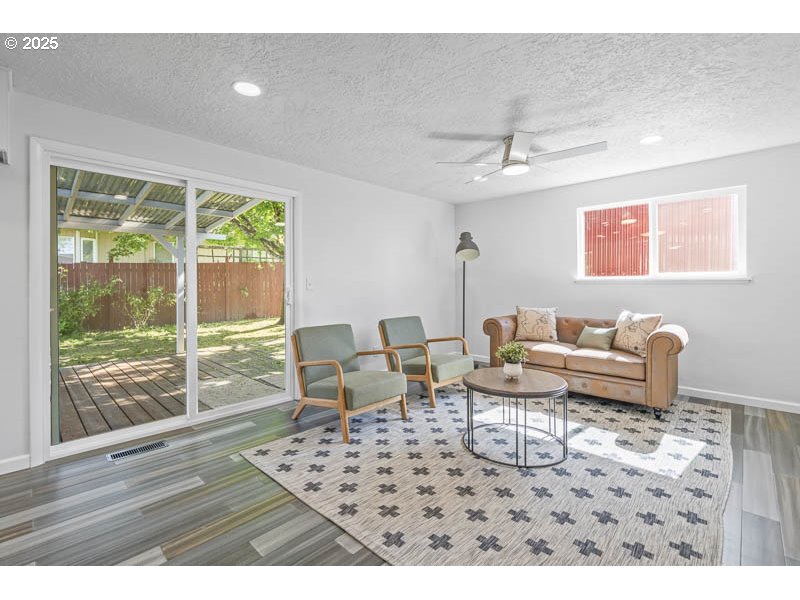 611 Northeast Bockes Loop Sheridan, OR 97378 - Photo 21 of 36 a living room with furniture and a window