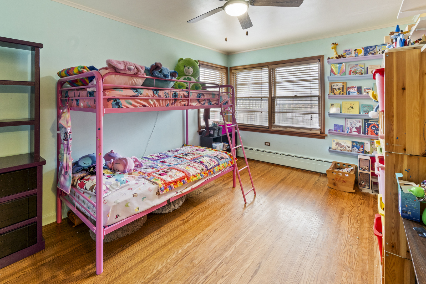 853 Orange Street Elgin, IL 60123 - Photo 11 of 28 a bedroom with a bed and a window